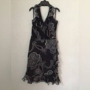 White House Black Market Woman’s Black & White Floral Midi Dress. Size 6.